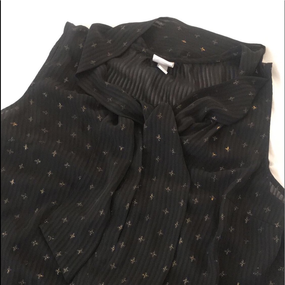 Beautiful sheer black dress top with gold accent!